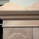 Antique English wardrobe in pale pink patina.