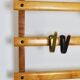 Rare coat rack by Carl Auböck with hat rack, cabinet, brass, walnut and beech, 1950s.
