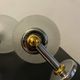Pair of Inda metal and chiseled glass wall lights