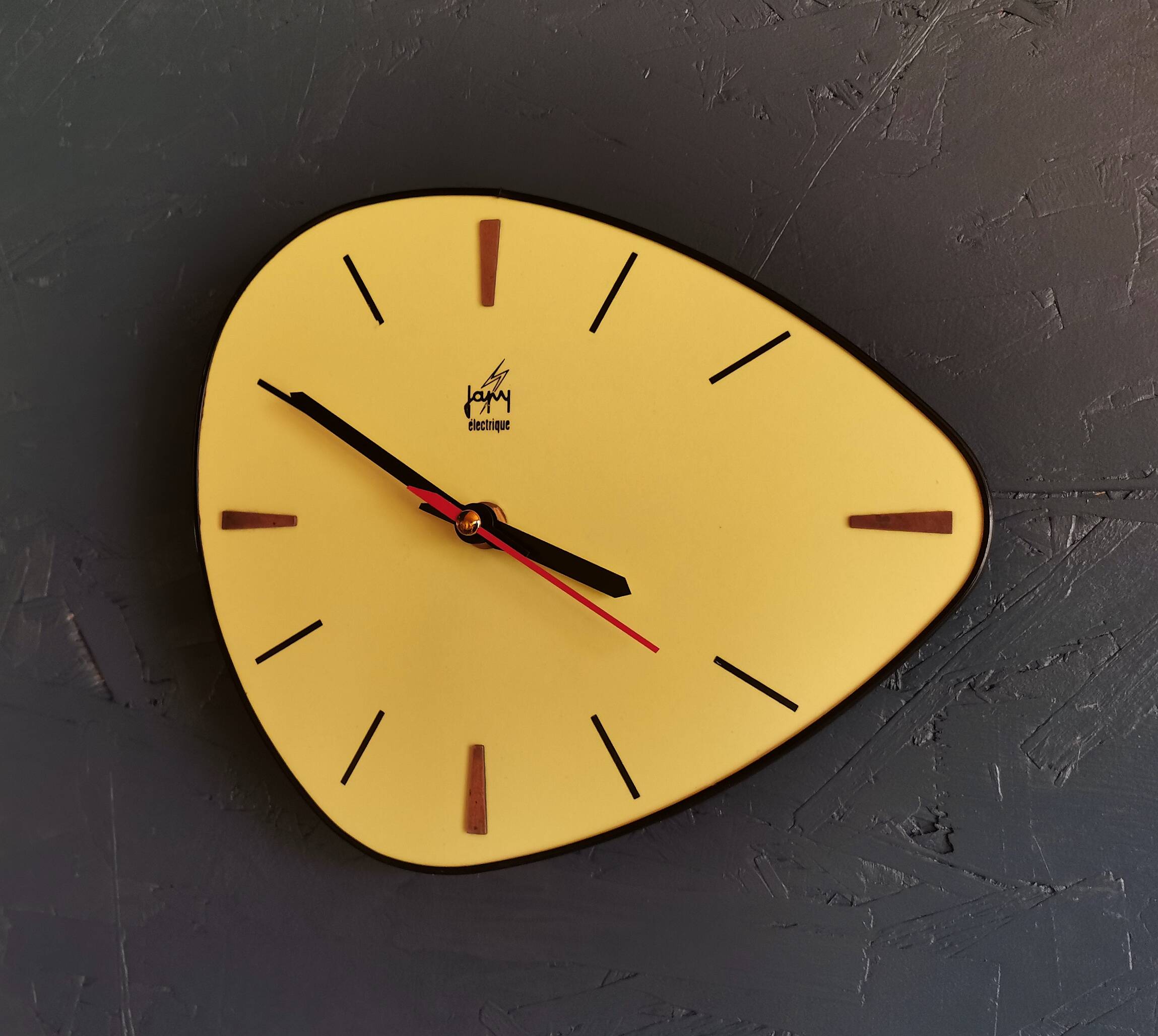 Vintage Formica clock silent asymmetrical wall pendulum "Yellow Japy"