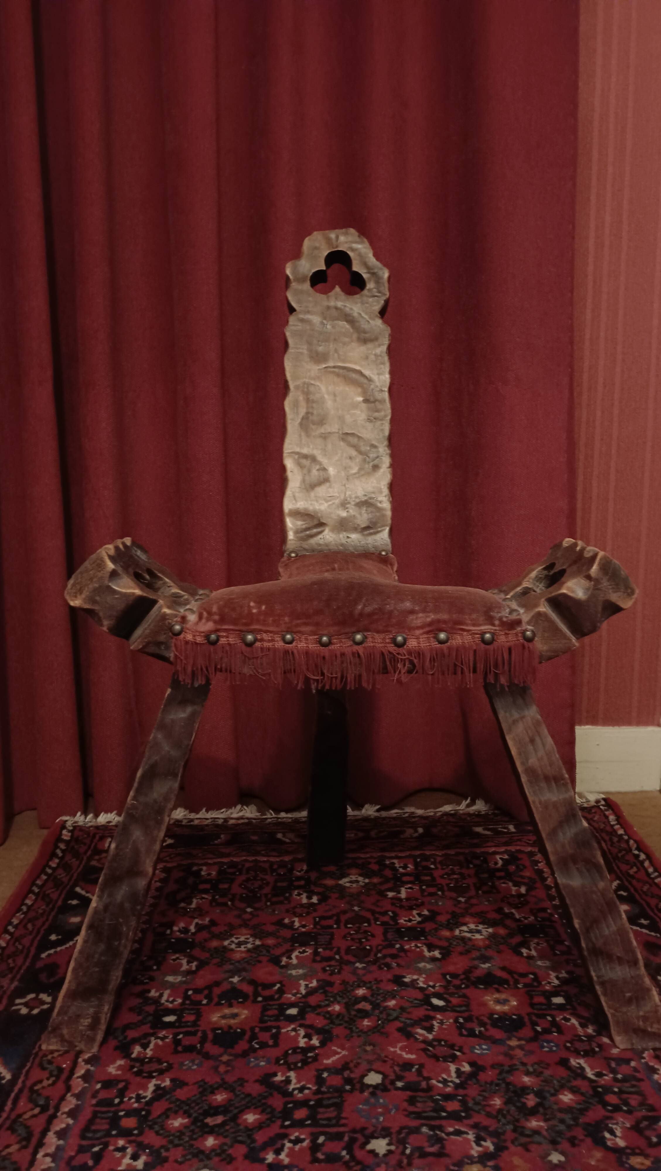 Brutalist chair with tripod legs