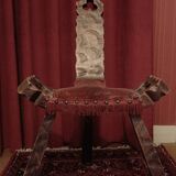 Brutalist chair with tripod legs