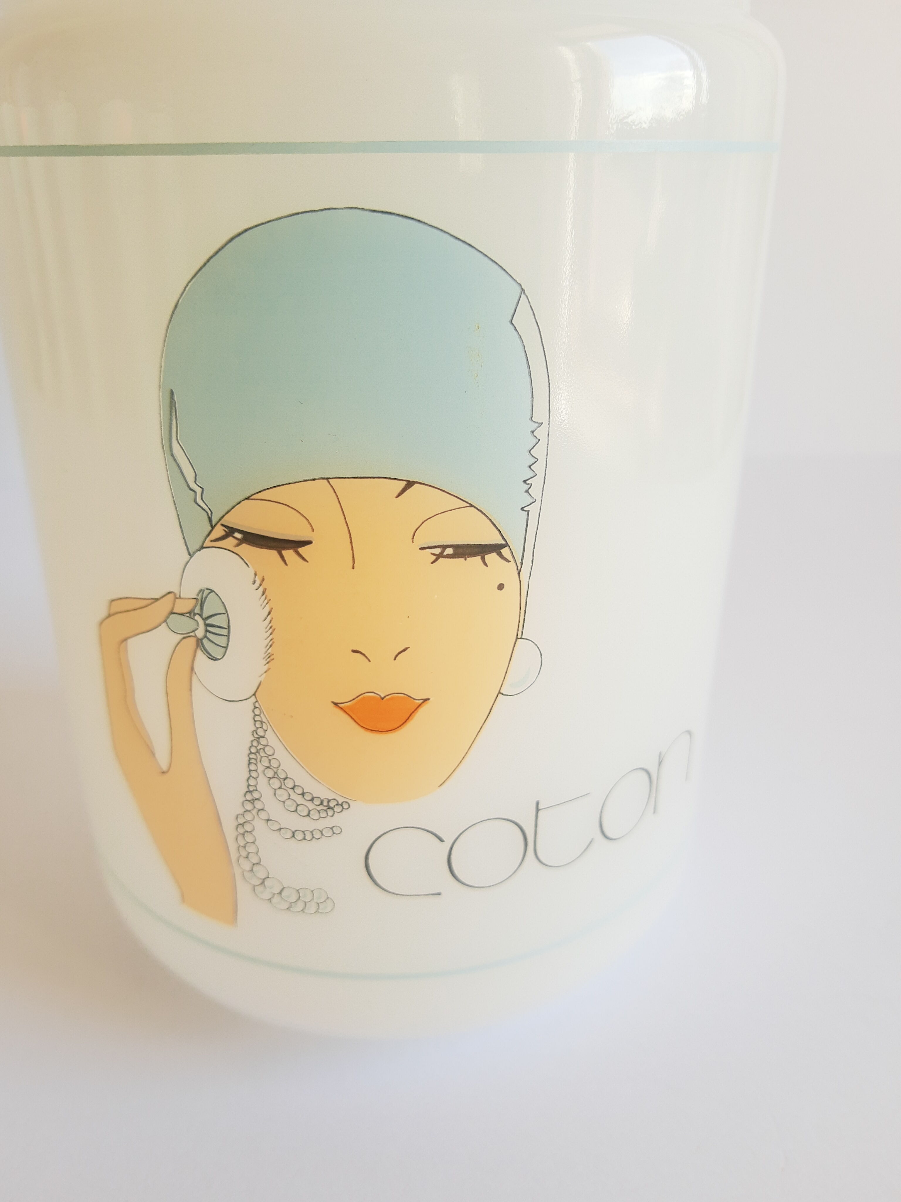 Old cotton bathroom pot in vintage opal year 1970