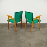 Pair of wood and vinyl armchairs