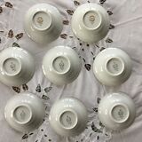 Porcelain cups, floral and gold decorations