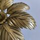 Gold metal flower wall light