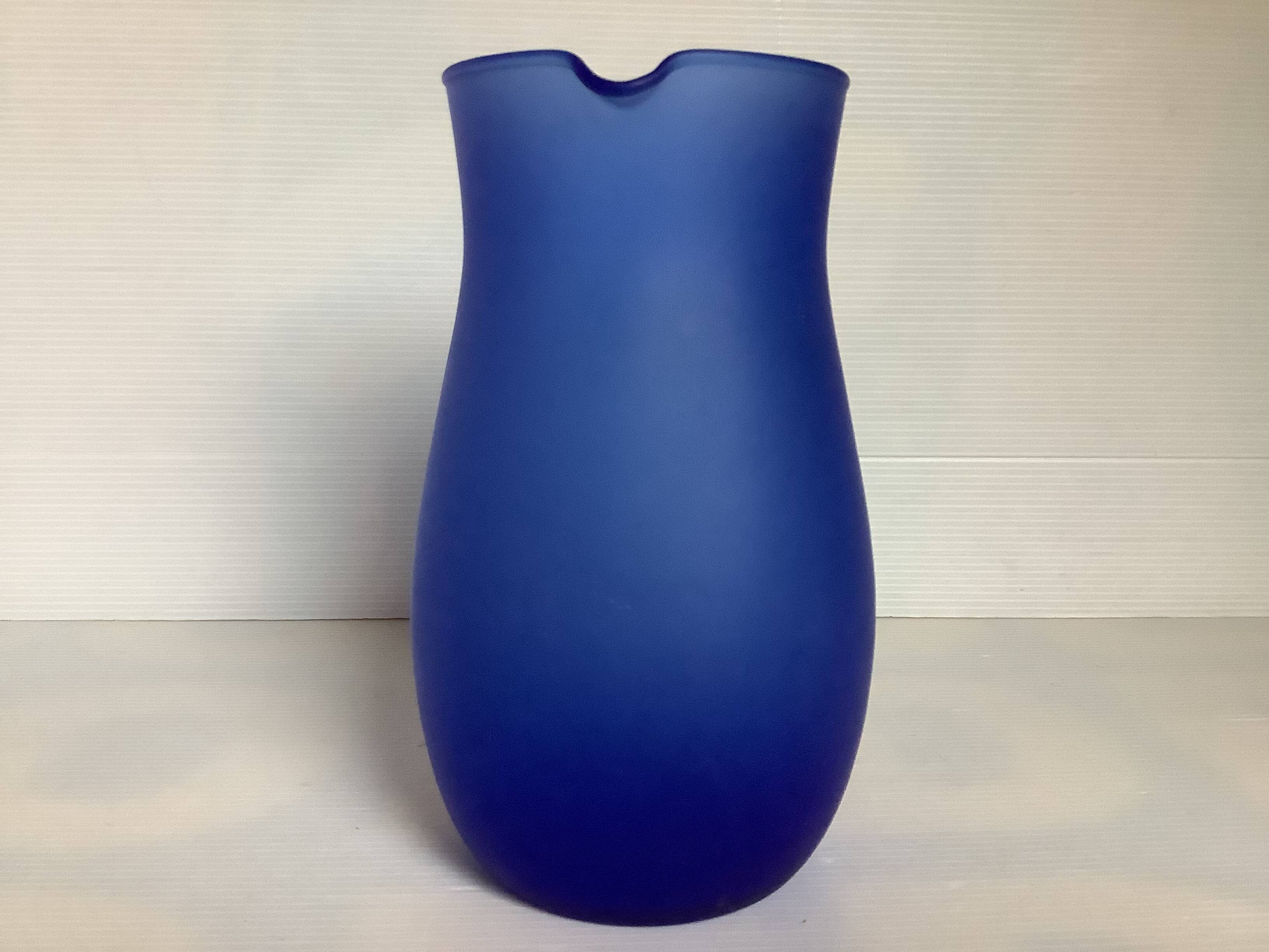 Blue glass paste pitcher