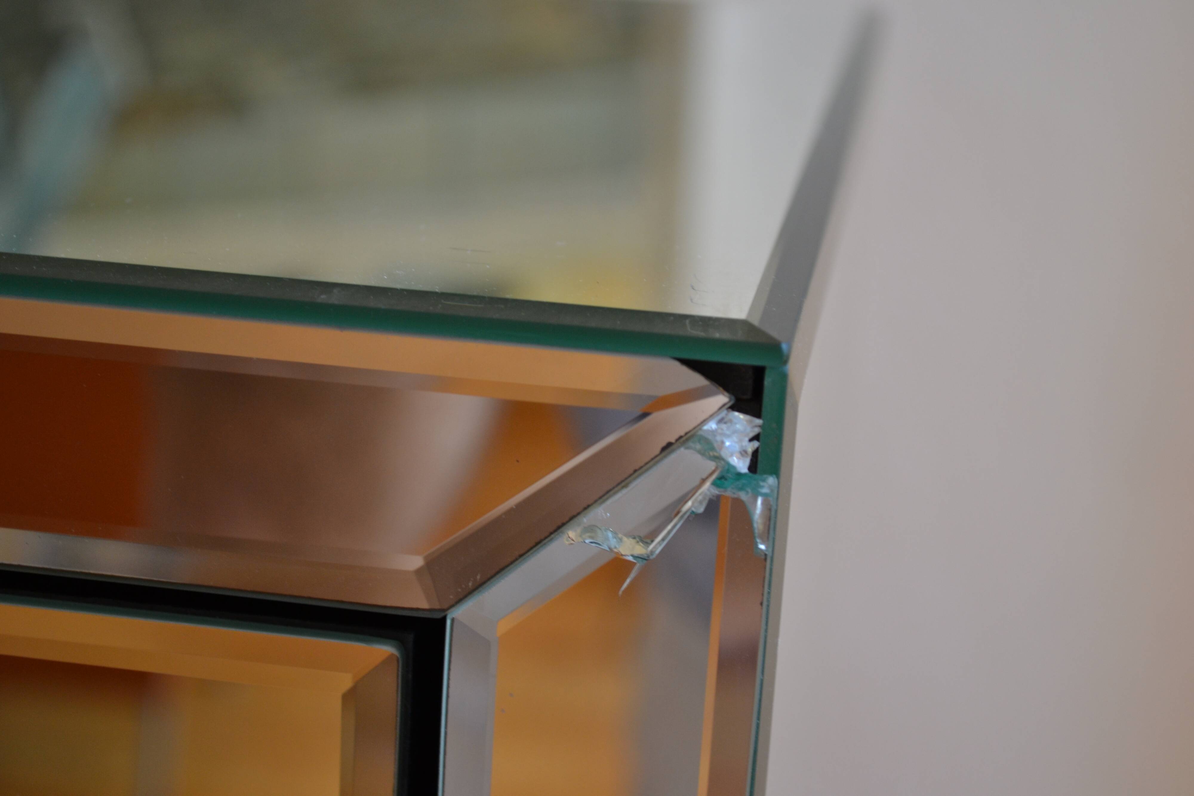 Hollywood Regency style beveled mirror bedside table