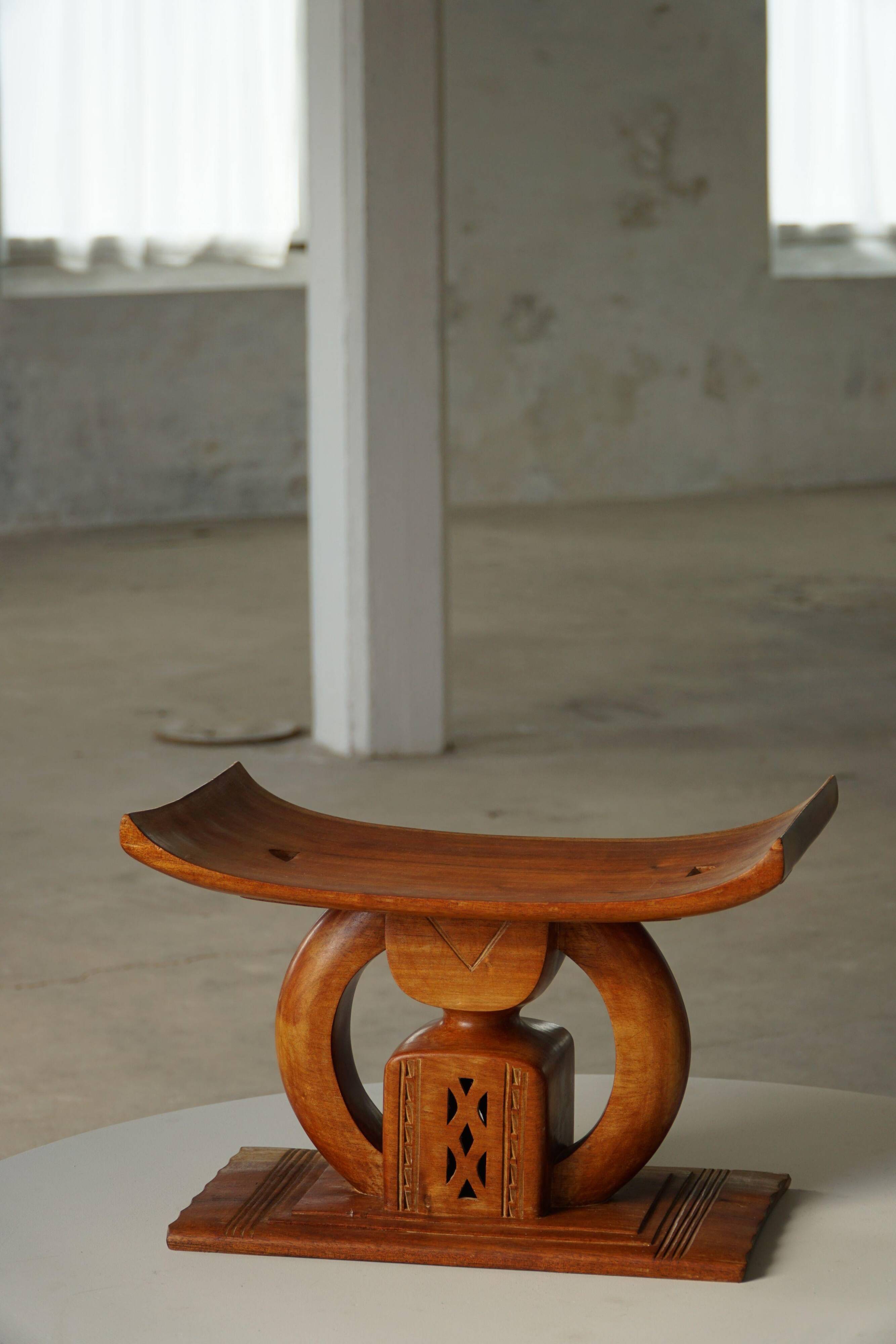 Ashanti stool from West Africa, carved from hardwood, 20th century.