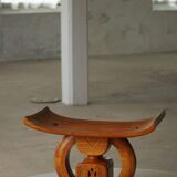 Ashanti stool from West Africa, carved from hardwood, 20th century.