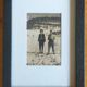 Framed vintage photograph of skiers.