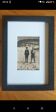 Framed vintage photograph of skiers.