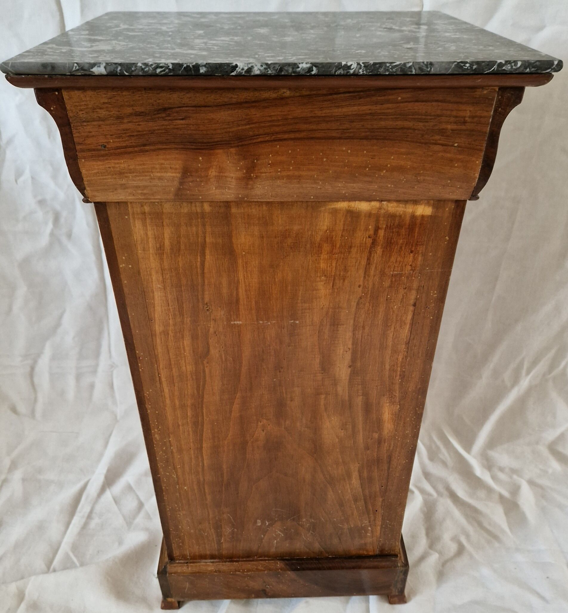Elegant antique Napoleon III side table in walnut with black marble veneer.