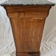 Elegant antique Napoleon III side table in walnut with black marble veneer.