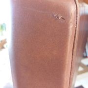 Scandinavian armchair in brown leatherette and wood