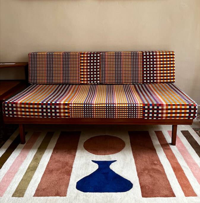 Peter Hvidt Knoll wooden banquette sofa with new cushions.