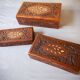Antique hand-carved wooden boxes.