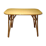 Vintage rattan dining table in the 60s