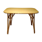 Vintage rattan dining table in the 60s