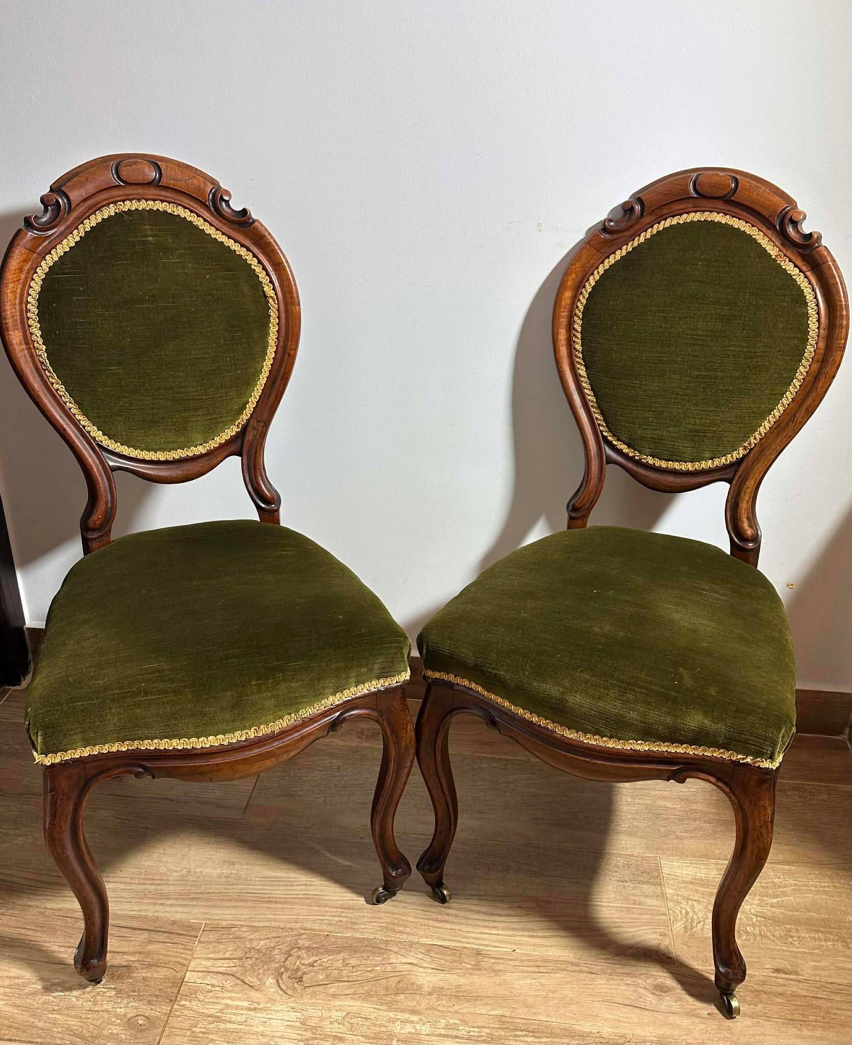 A pair of antique upholstered side chairs/Victorian balloon-back