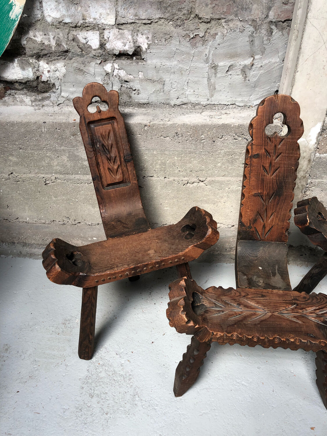 Brutalized tripod chairs