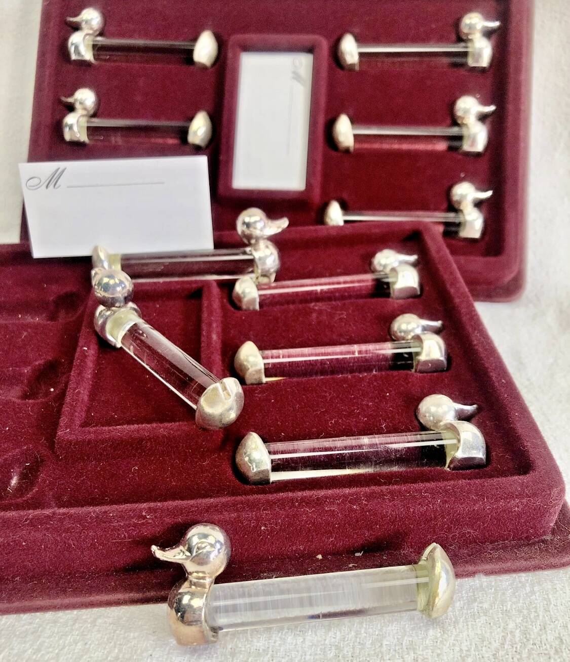 12 silver-plated metal duck knife rests with crystal