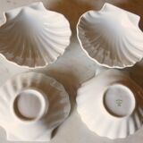 4 antique cups in the shape of a white porcelain shell