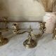Pair of rocaille candlesticks in gilded bronze