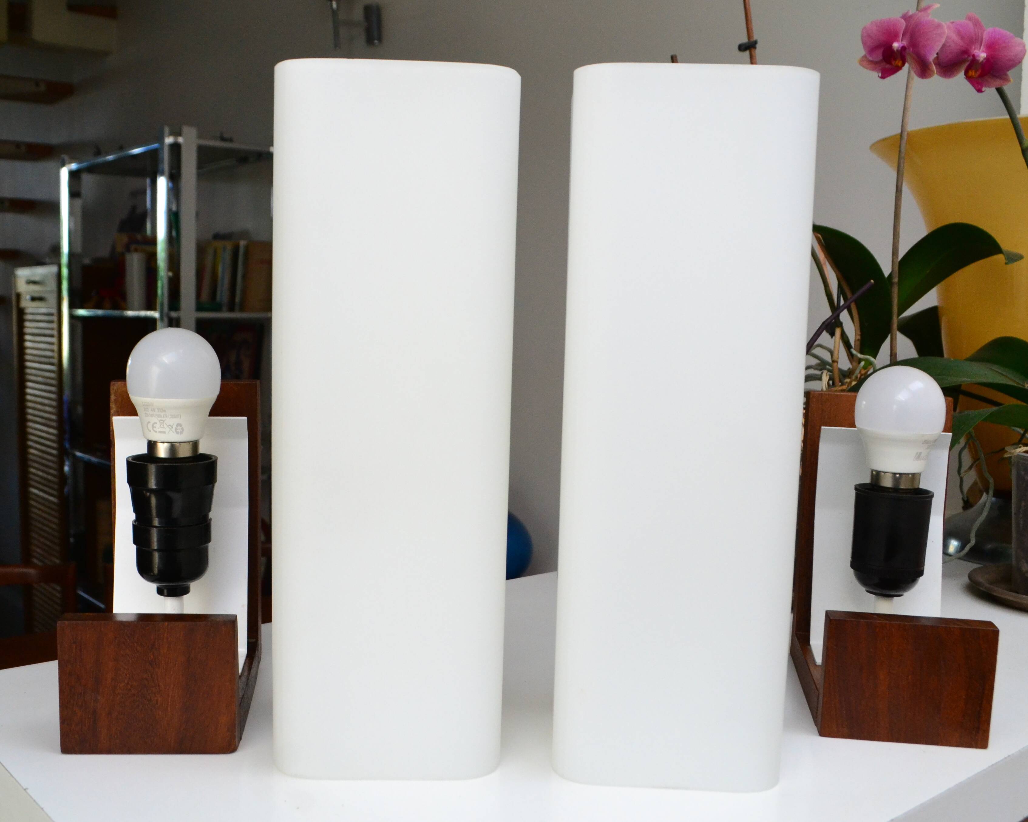 Pair of Louis Kalff opaline and teak wall lights from the 1950s/60s