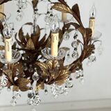 Chandelier with tassels and golden brass