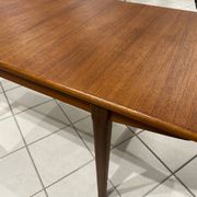 Large extendable Scandinavian table in vintage teak from the 1970s.