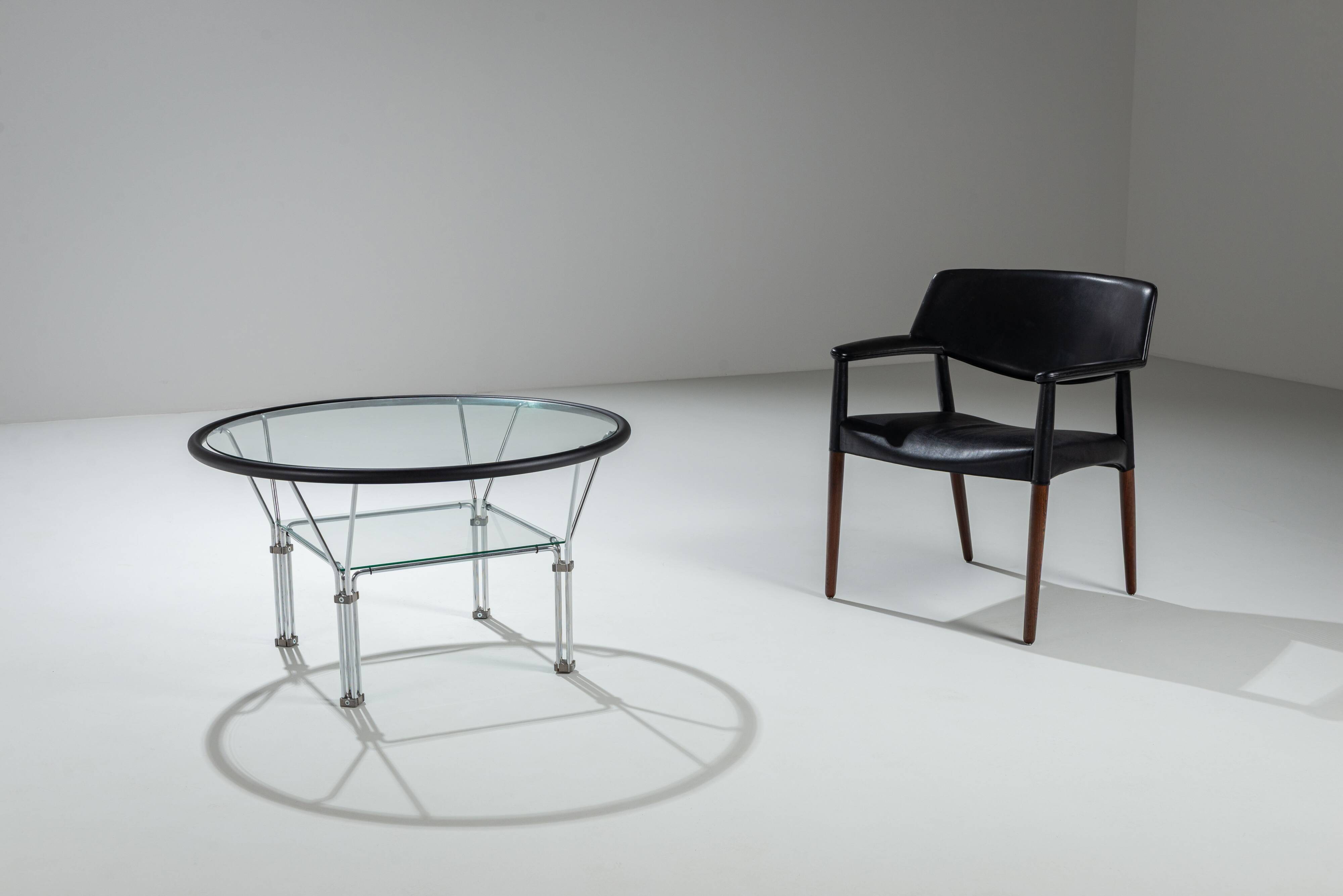 Post-Modern round glass and steel coffeetable attributed to Niels Bendtsen