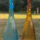 Pair of glass bottles of Empoli made in Italy 1960