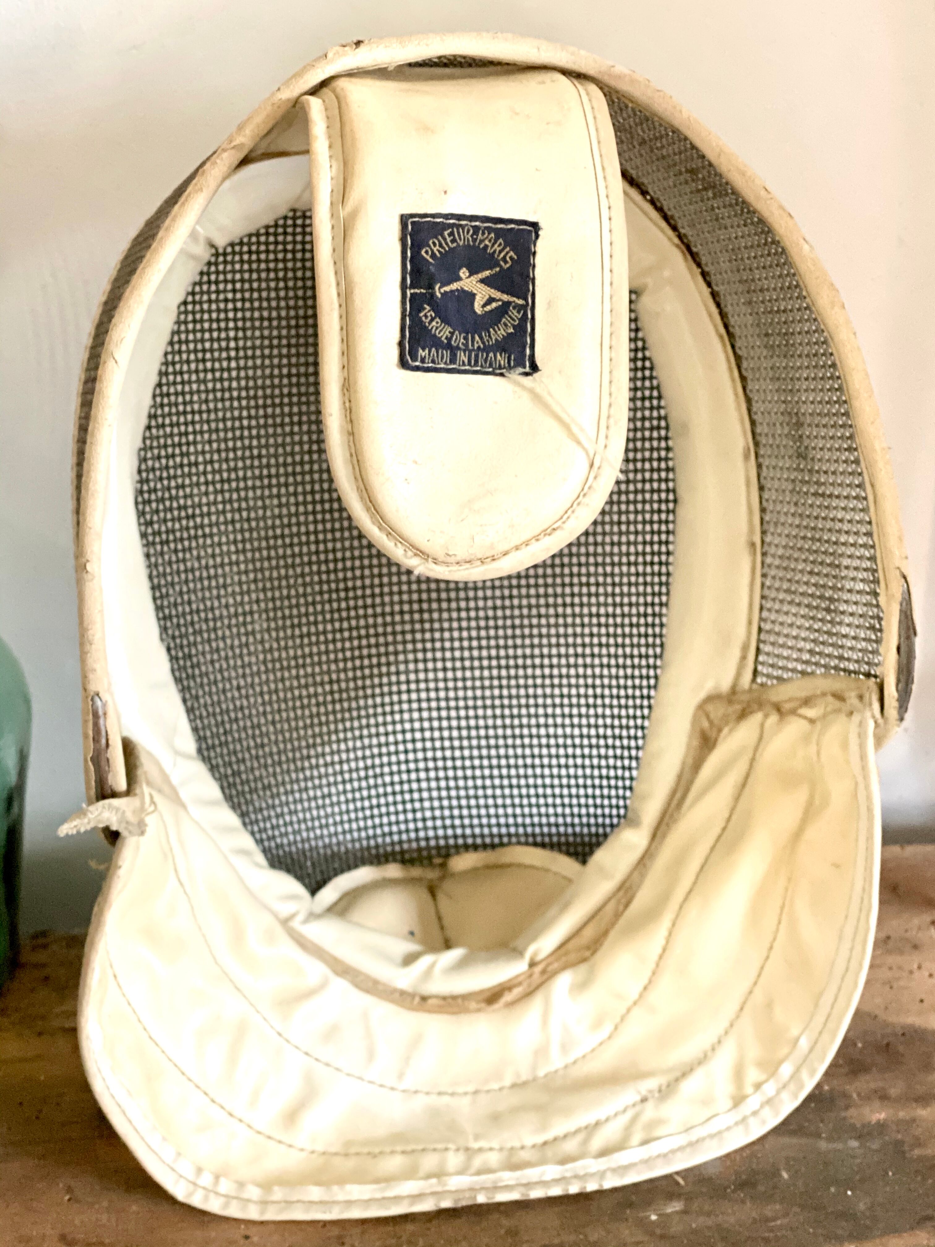 Old fencing mask set and its foil