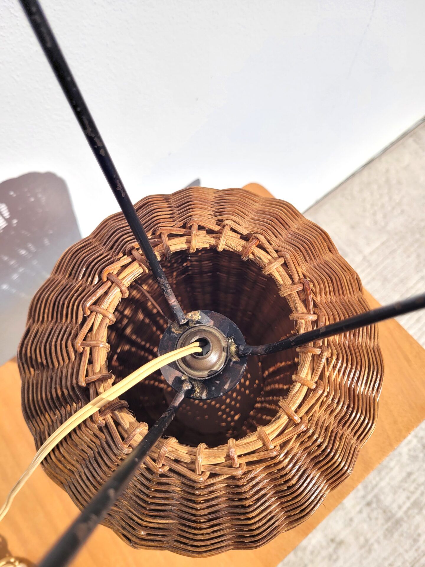 Tripod lamp and rattan from the 1950s.