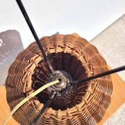 Tripod lamp and rattan from the 1950s.