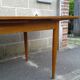 Table extensible en teck