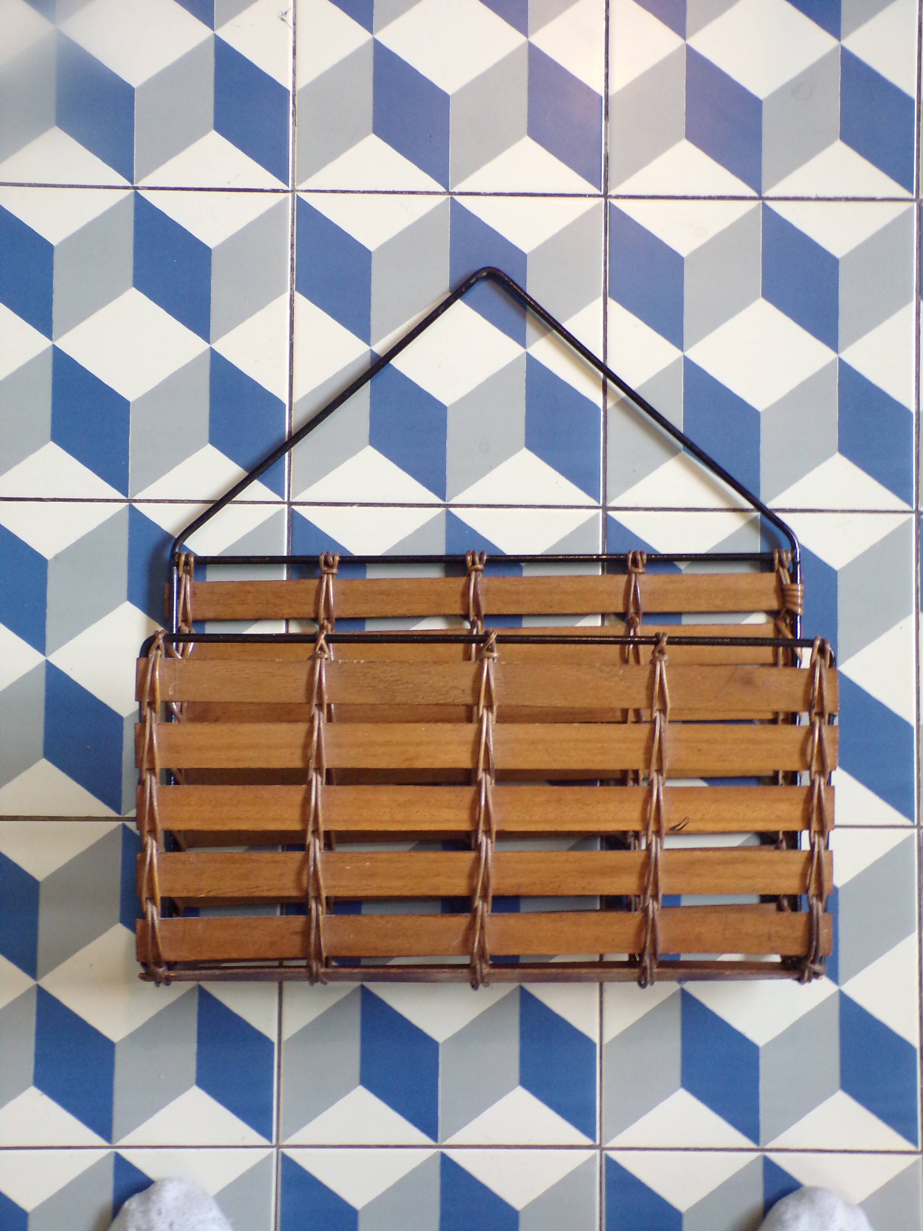 Vintage wall-mounted magazine rack