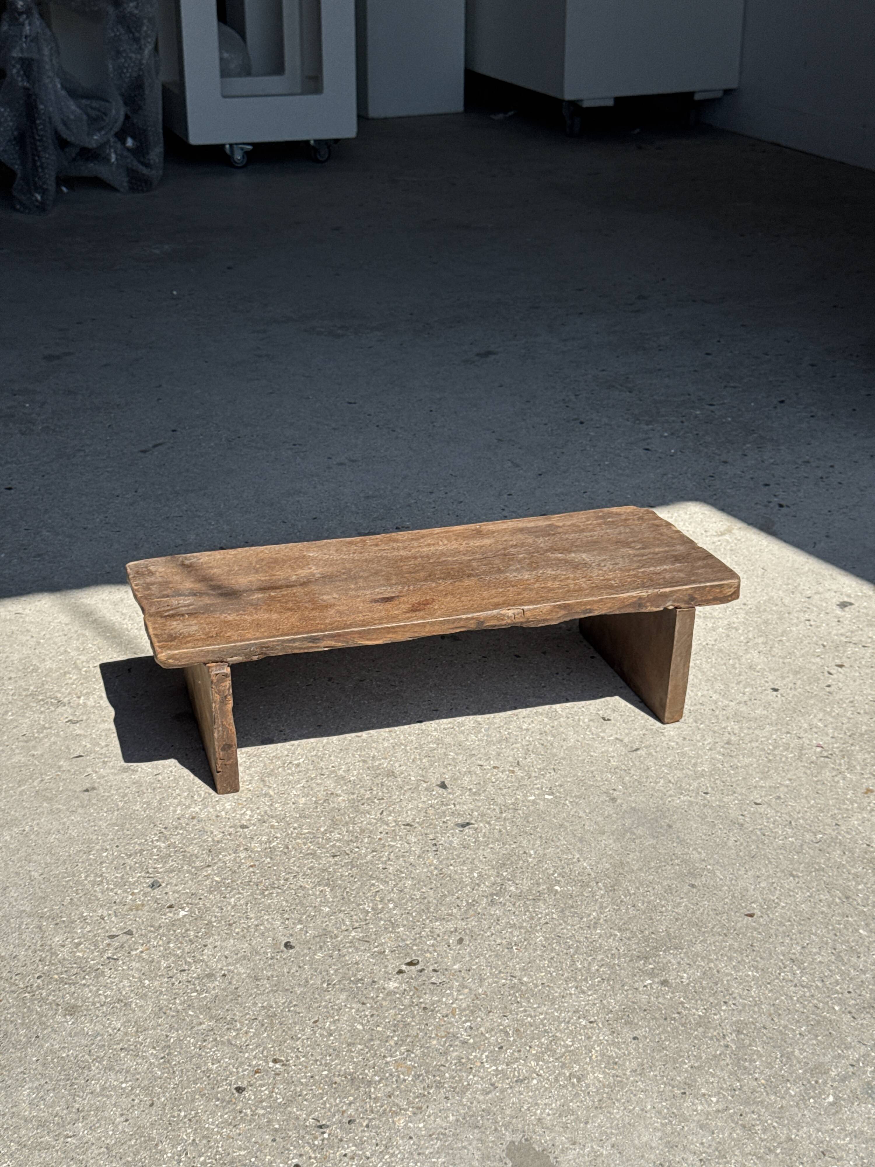 Small low bench in old teak from Indonesia H14 L50
