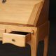 Sloped wooden desk in light wood, ideal for remote work. Secret drawer.