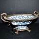 Blue Chinese floral porcelain coupe on a bronze base table centrepiece.