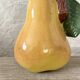 Vintage ceramic bottle in the shape of a pear.