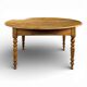 Louis Philippe table with extensions in cherry wood.