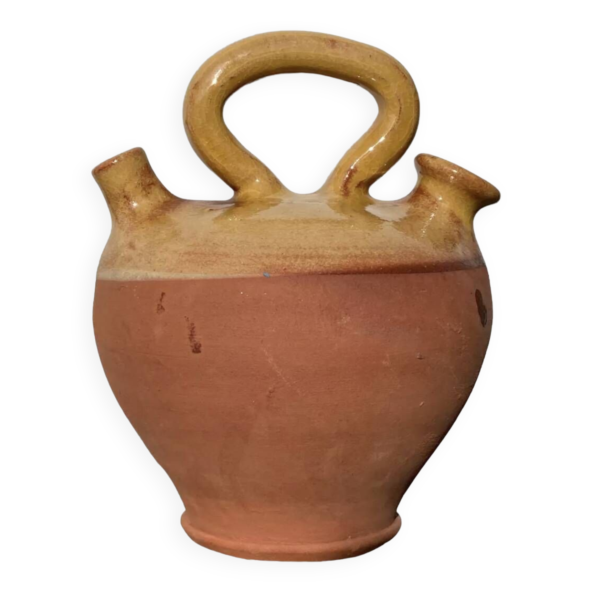 Gargoulette or old jug in yellow glazed terracotta