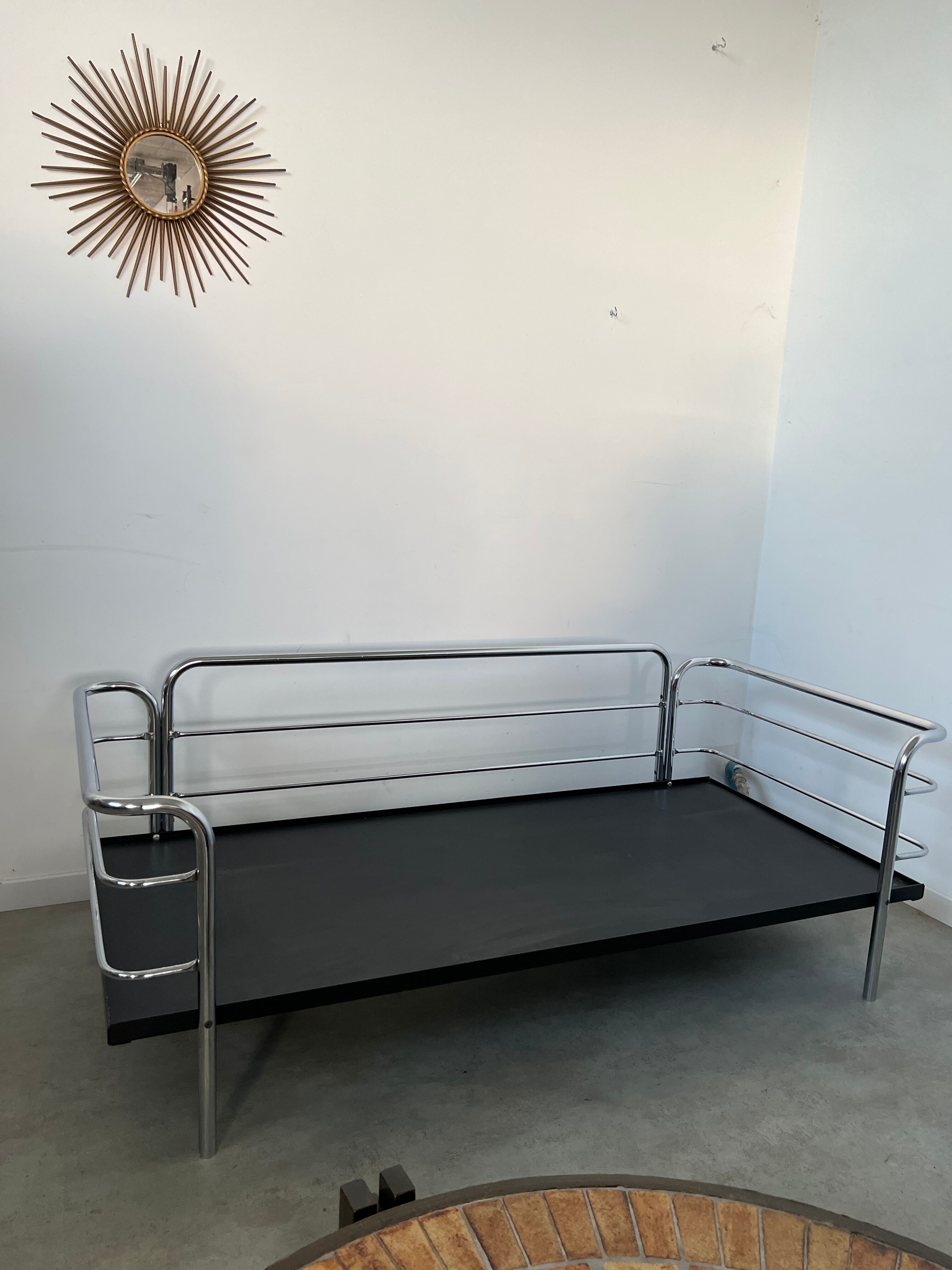 Old vintage leather and tubular metal sofa, design 70s