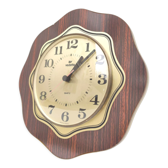 Horloge Vedette vintage dorée formica forme fleur