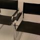 Pair of chrome and leather tube chairs