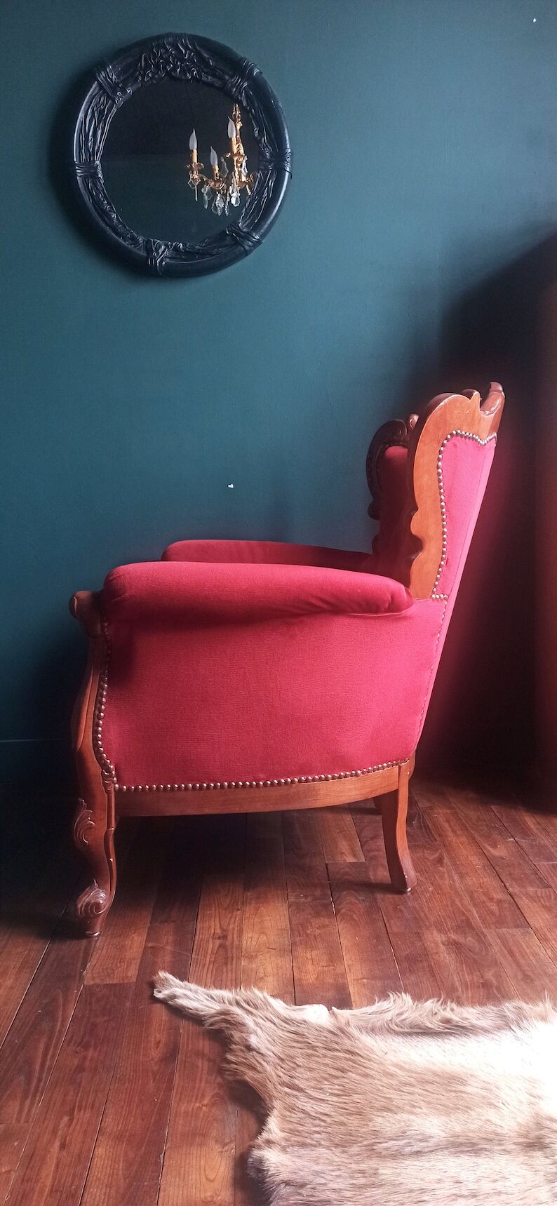 Baroque style carved wooden armchair in burgundy red velvet