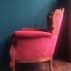 Baroque style carved wooden armchair in burgundy red velvet