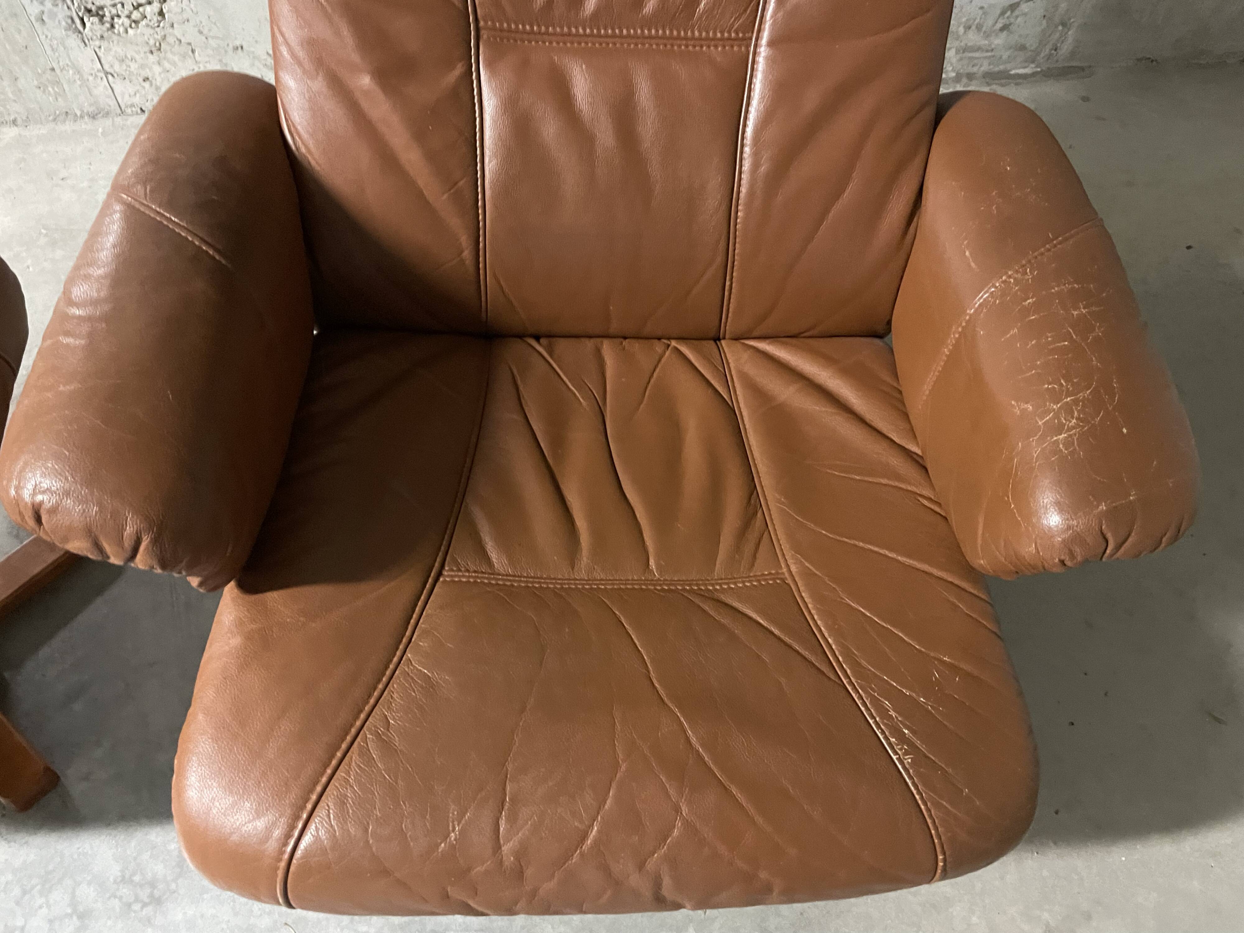 Unico leather armchair and ottoman